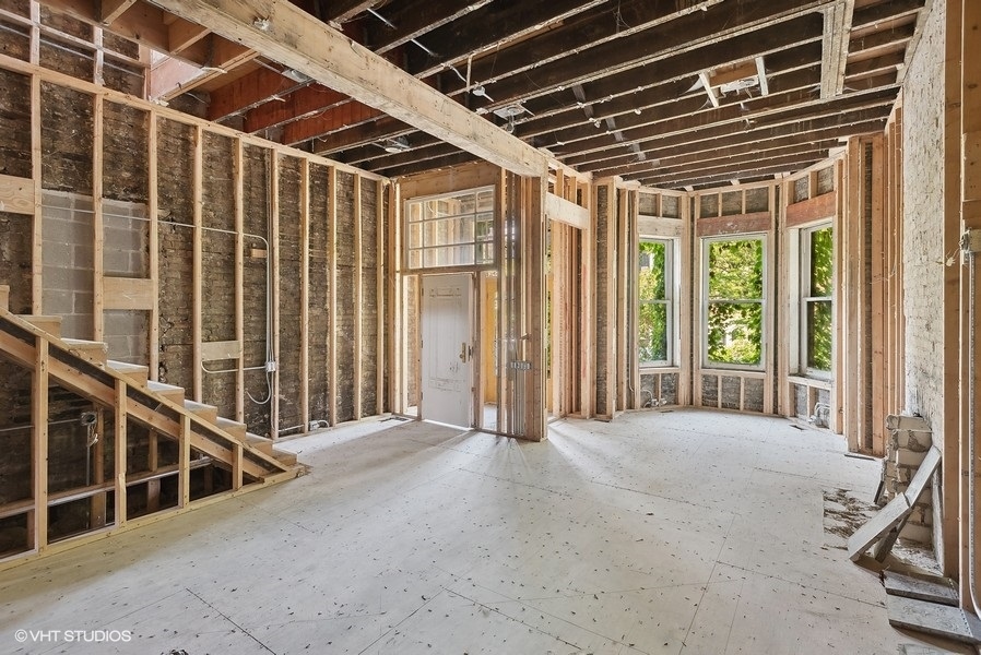 1823 North Lincoln Park West Chicago, IL 60614 - Photo 6 of 16 a view of porch with two chairs and a window