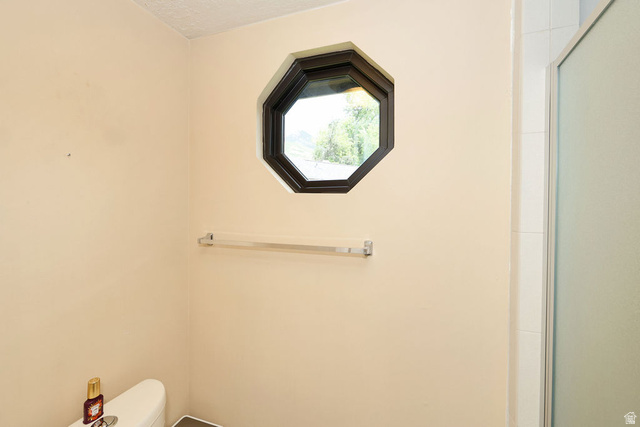3104 East High Danish Road Sandy, UT 84093 - Photo 23 of 36 2nd floor primary bathroom water closet and shower.