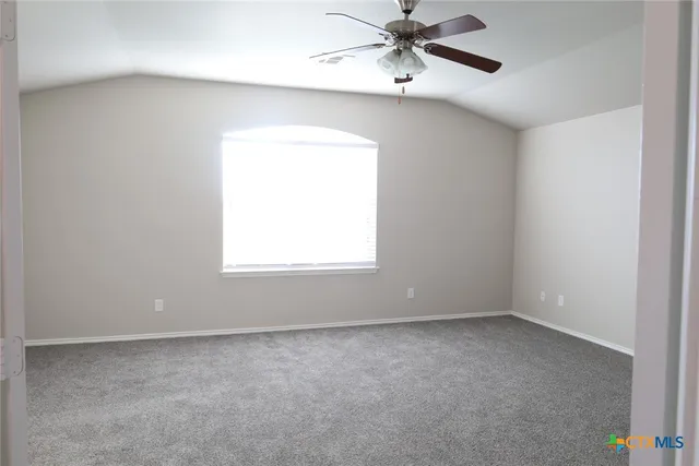 a view of an entryway with kitchen