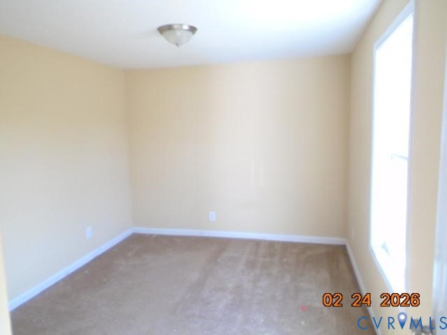 3034 Bradley Farm Road Tappahannock, VA 22560 - Photo 3 of 14 Carpeted spare room with baseboards