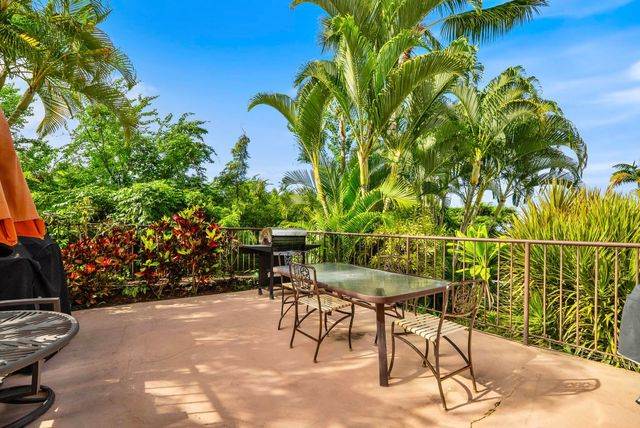 a view of yard with patio