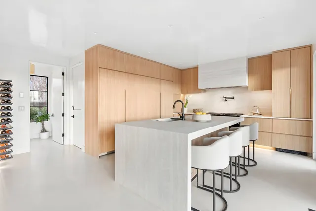 a view of balcony with furniture and wooden floor
