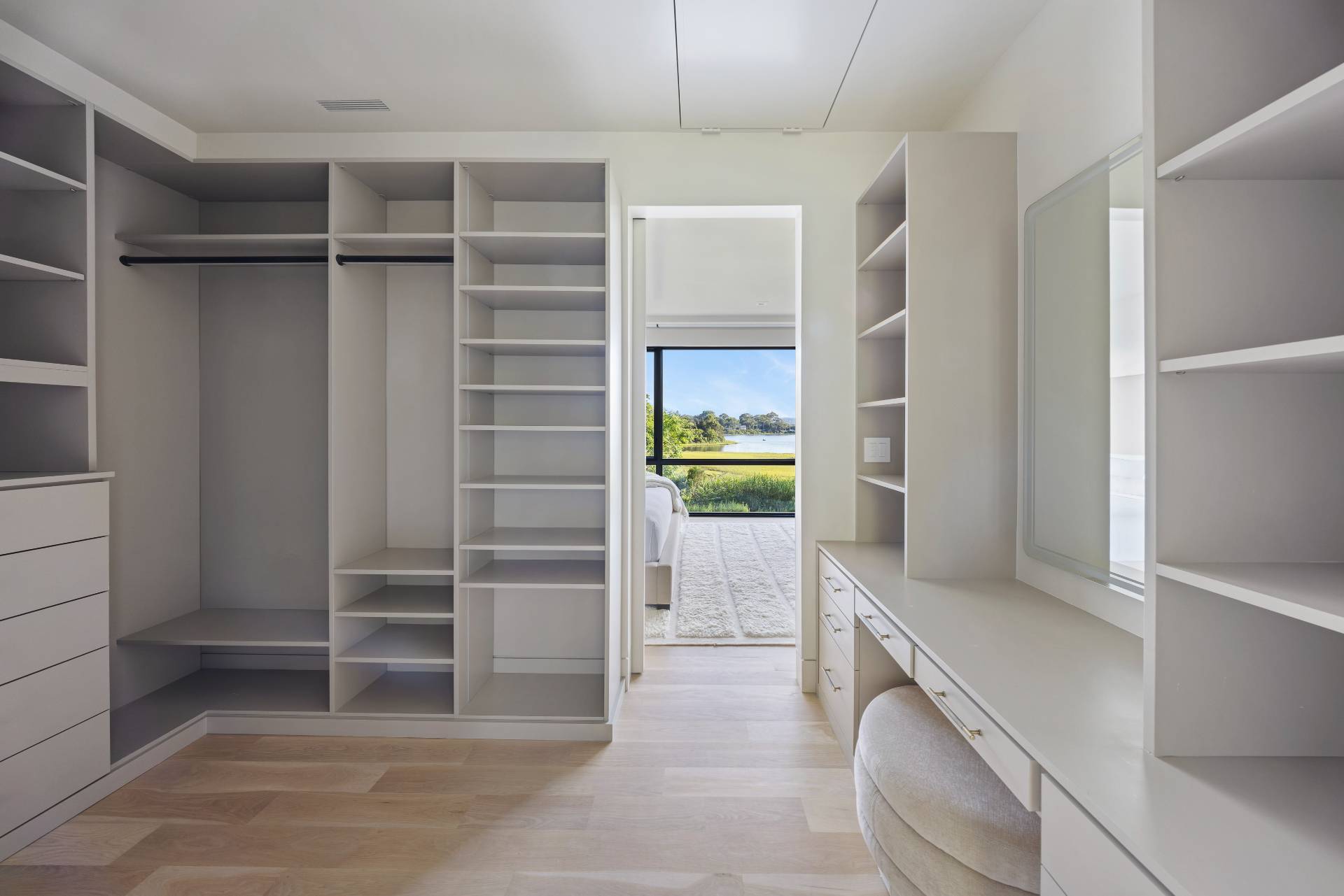 4 3rd Street Sag Harbor, NY 11963 - Photo 22 of 45 a view of walk in closet with empty racks