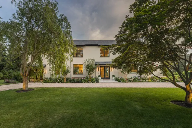 front view of a house with a swimming pool