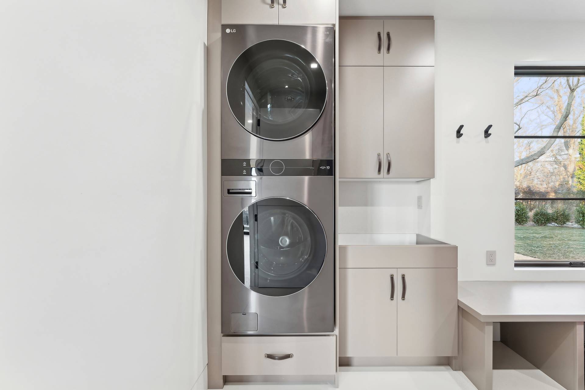 4 3rd Street Sag Harbor, NY 11963 - Photo 41 of 45 a utility room with dryer and washer