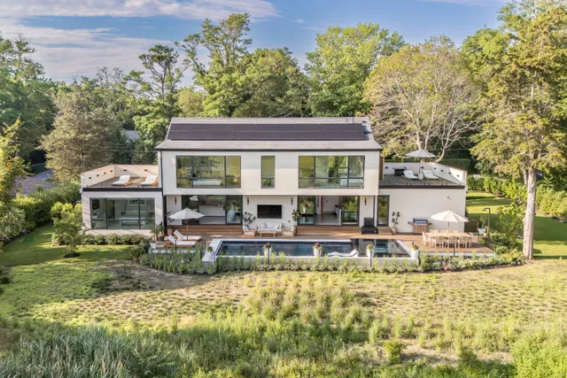 a view of bathroom with a sink and window