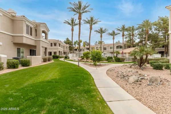 a view of an empty room with a fireplace