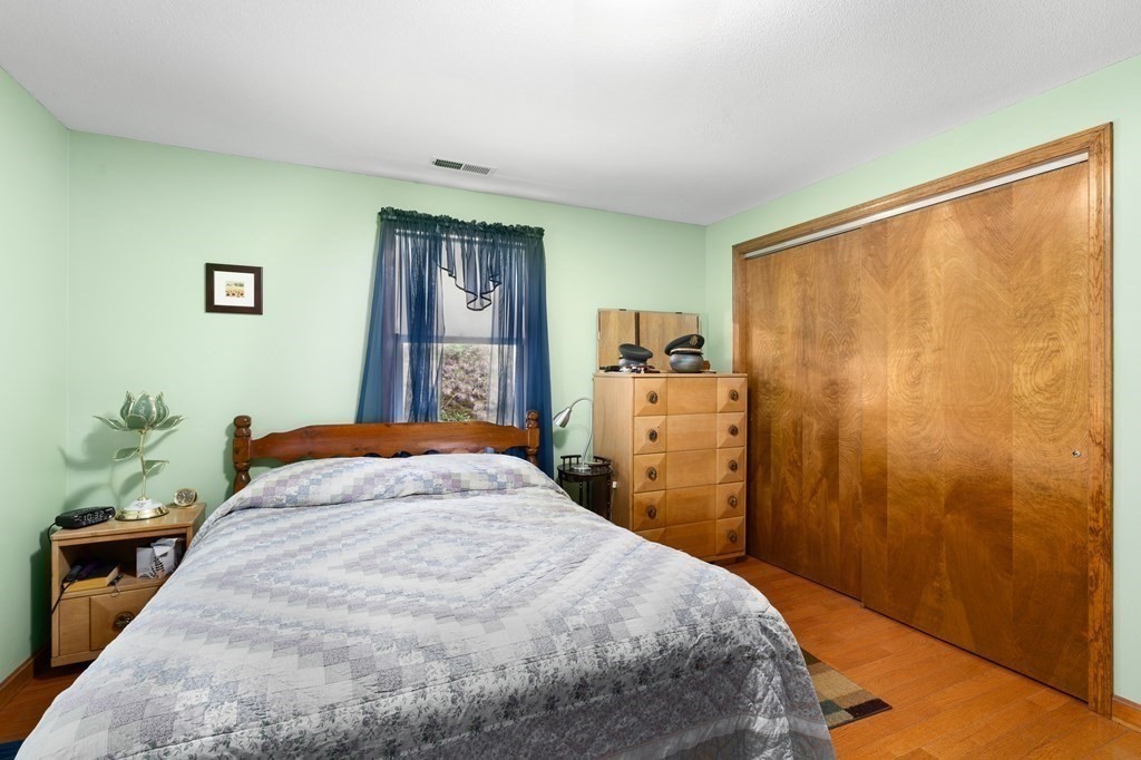32 Middle Road Southampton, MA 01073 - Photo 20 of 39 a bedroom with a bed and a window