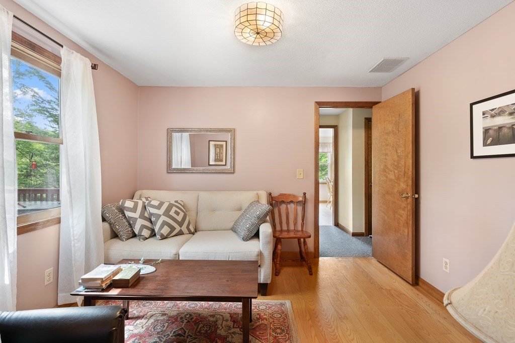 32 Middle Road Southampton, MA 01073 - Photo 29 of 39 a living room with furniture and a window