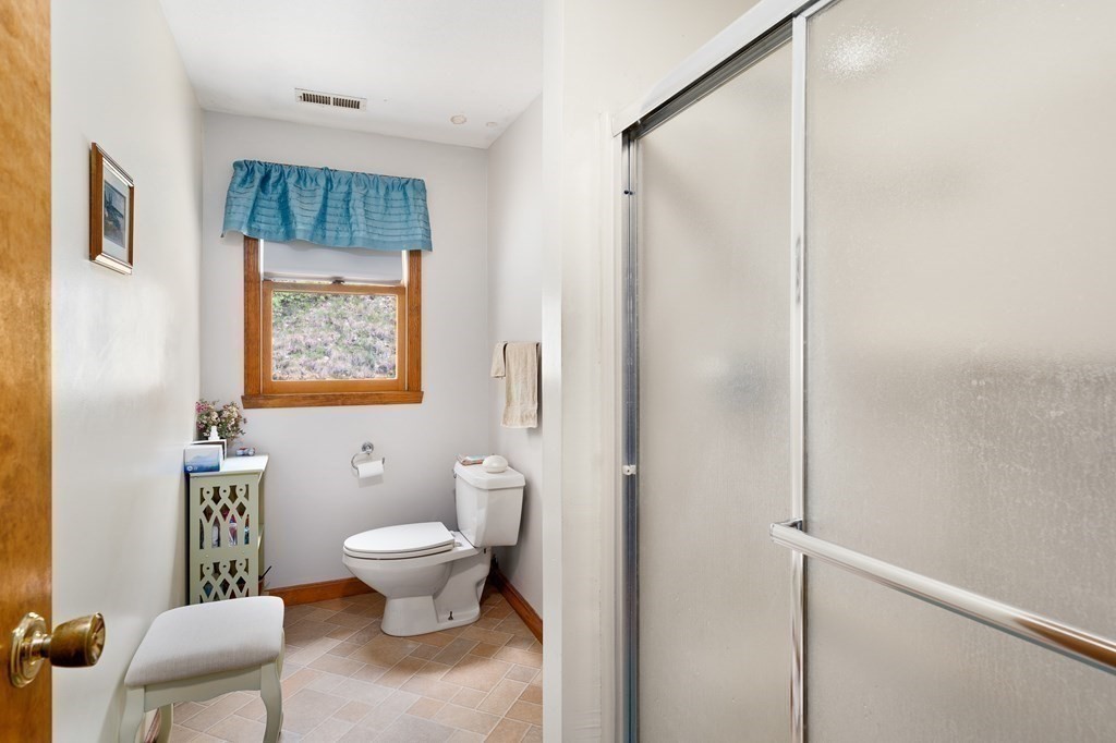 32 Middle Road Southampton, MA 01073 - Photo 30 of 39 a bathroom with a toilet sink and shower