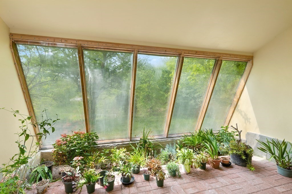 32 Middle Road Southampton, MA 01073 - Photo 34 of 39 a view of a potted plant next to a window
