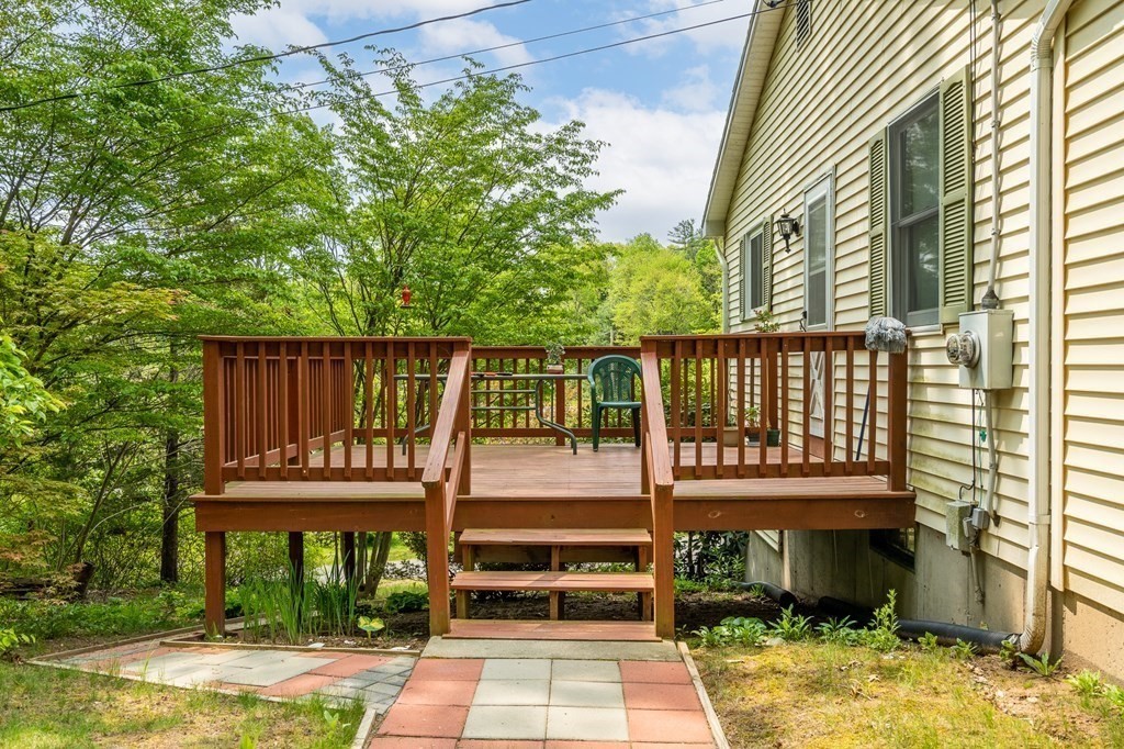 32 Middle Road Southampton, MA 01073 - Photo 37 of 39 a balcony with a table and chairs