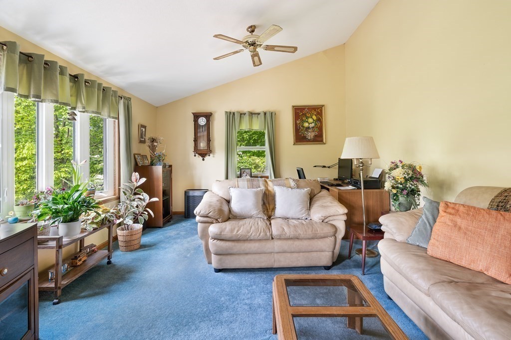 32 Middle Road Southampton, MA 01073 - Photo 8 of 39 a living room with furniture and a large window