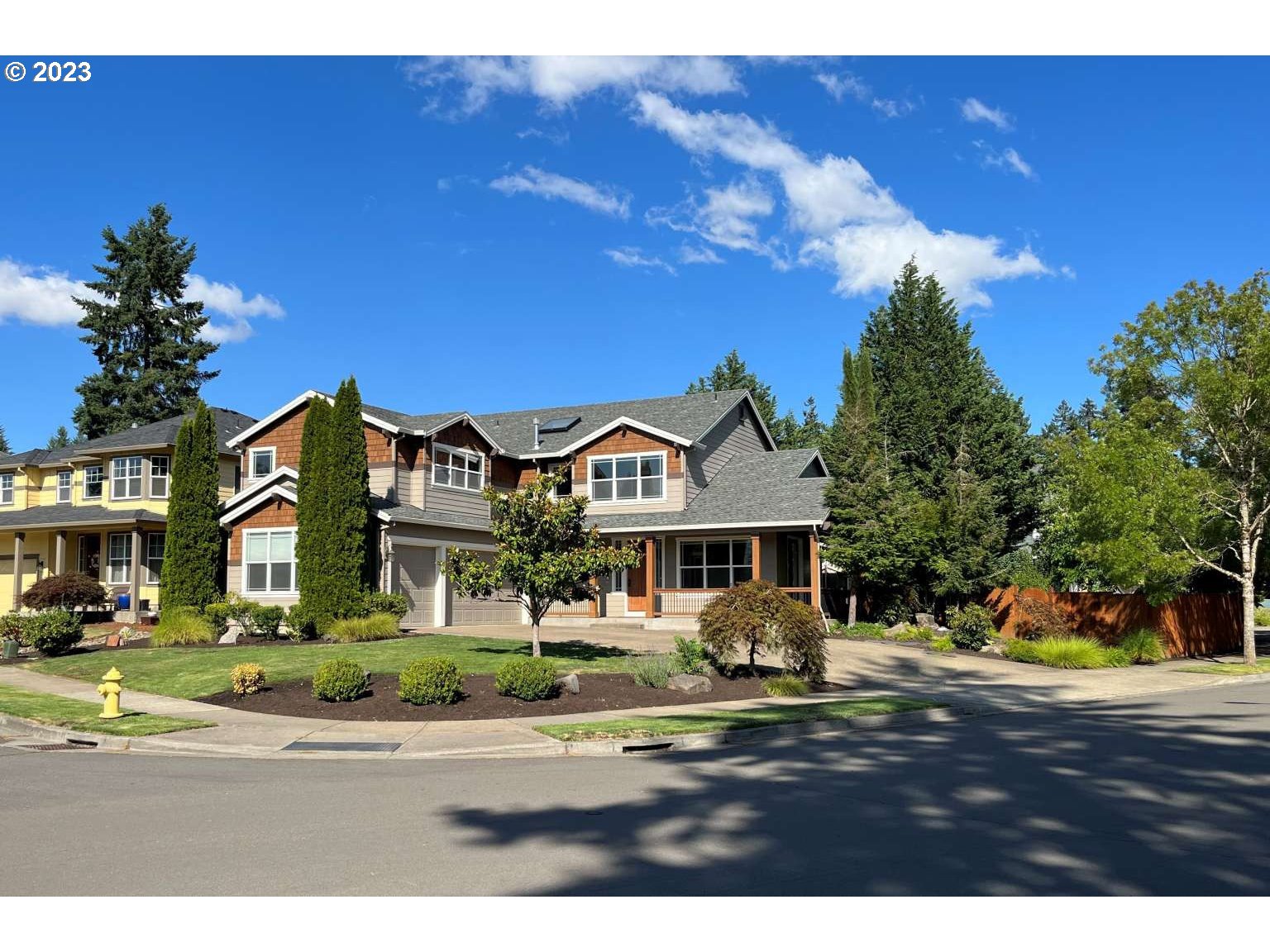 199 Northwest Camp Ireland Street Hillsboro, OR 97124 - Photo 12 of 36 a view of multiple houses with a street
