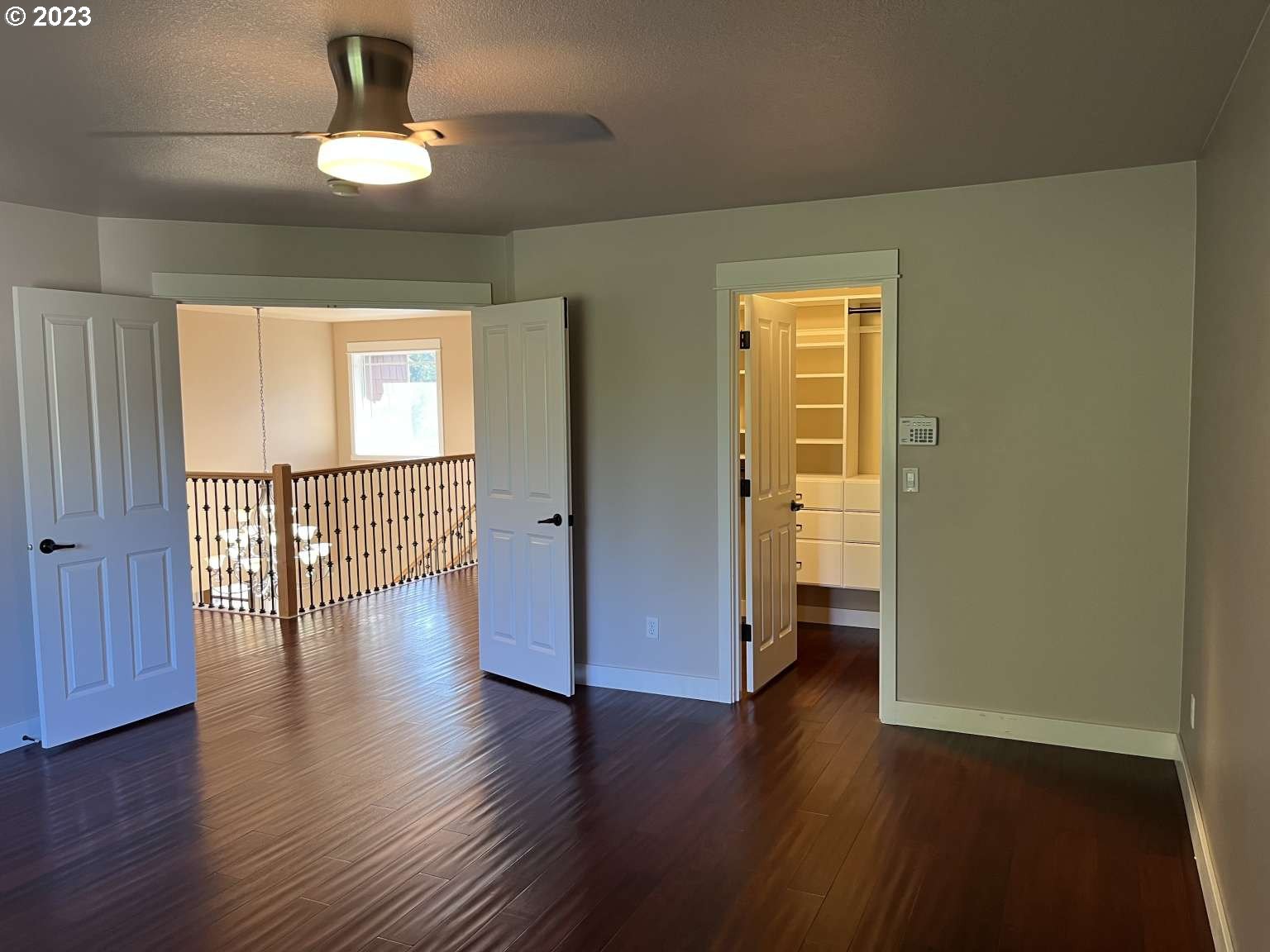 199 Northwest Camp Ireland Street Hillsboro, OR 97124 - Photo 14 of 36 a view of an empty room with wooden floor and a window