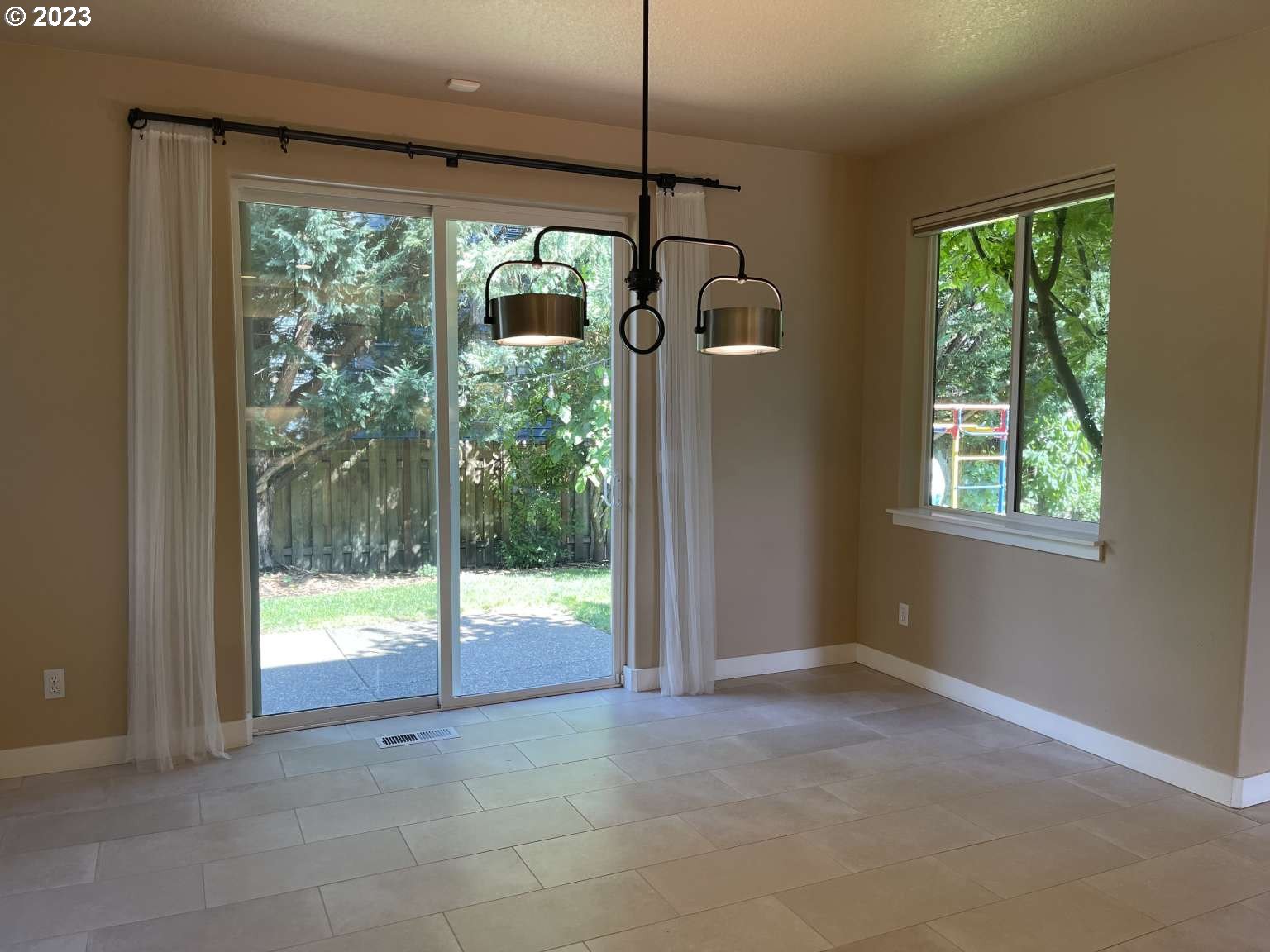 199 Northwest Camp Ireland Street Hillsboro, OR 97124 - Photo 3 of 36 a view of a room with window