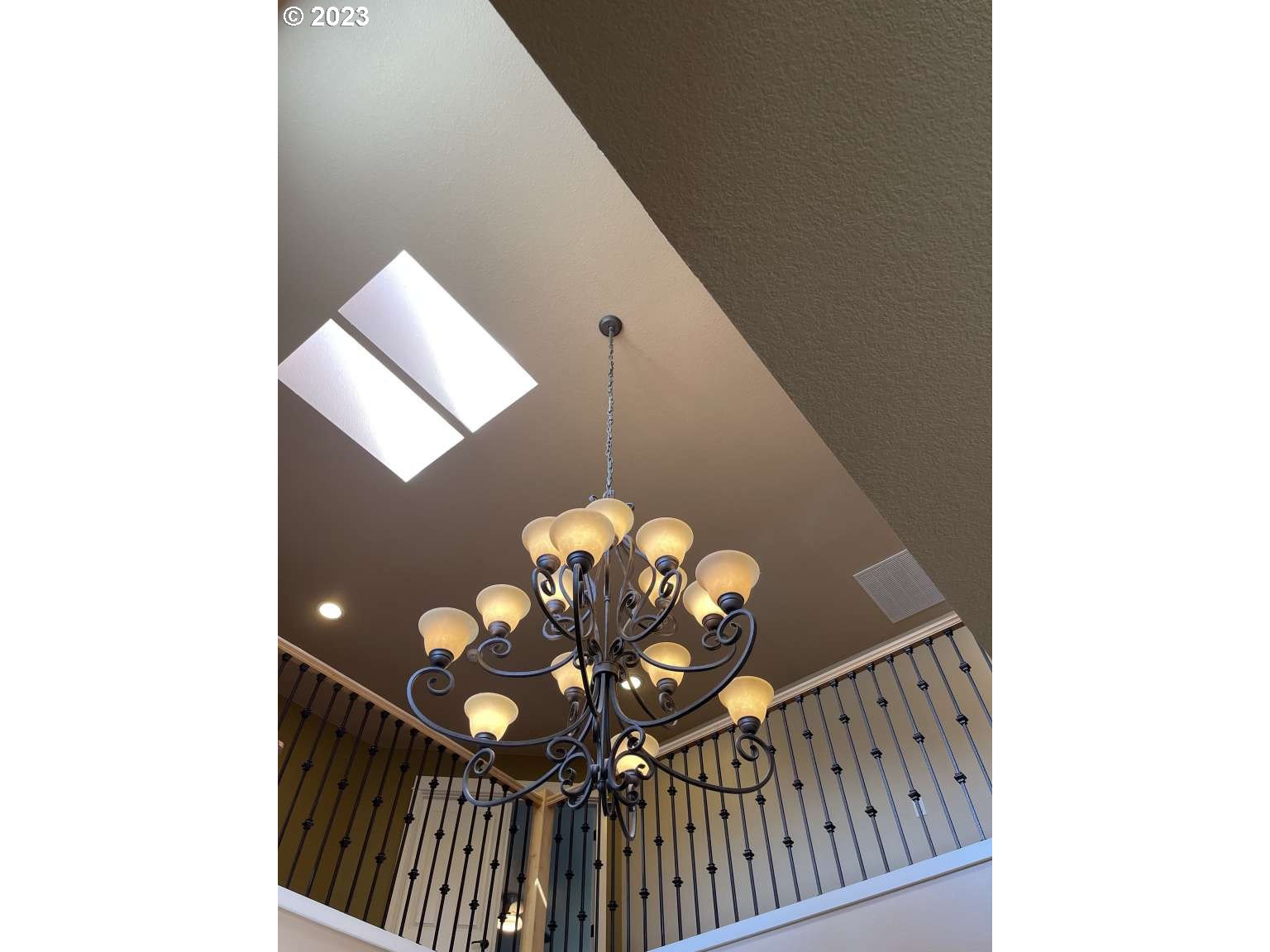 199 Northwest Camp Ireland Street Hillsboro, OR 97124 - Photo 33 of 36 a view of entryway with a chandelier