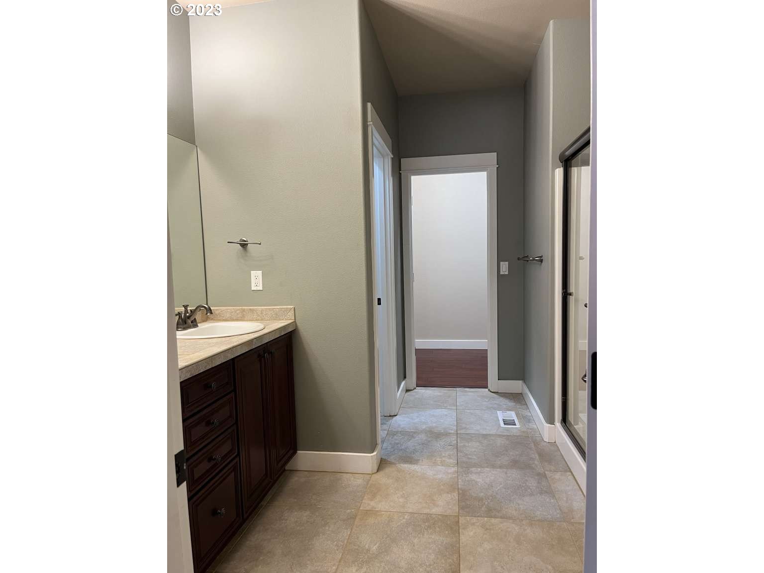 199 Northwest Camp Ireland Street Hillsboro, OR 97124 - Photo 8 of 36 a bathroom with a sink and a mirror
