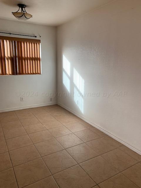 3610 South Harrison Street Amarillo, TX 79110 - Photo 5 of 8 a view of an empty room and window