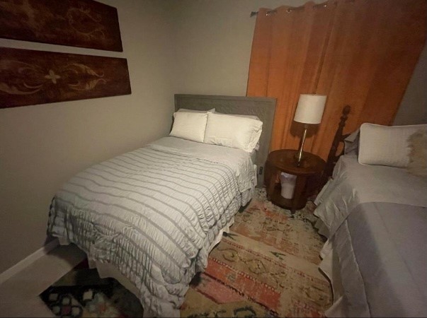 5711 Toddington Road Humble, TX 77346 - Photo 28 of 35 a bedroom with a bed and a window