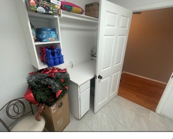 5711 Toddington Road Humble, TX 77346 - Photo 32 of 35 a view of entryway with wooden floor