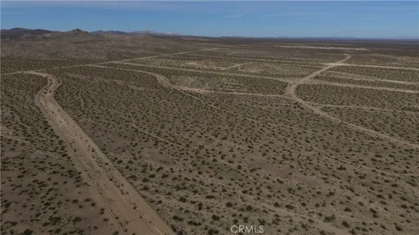 a view of a room next to a yard