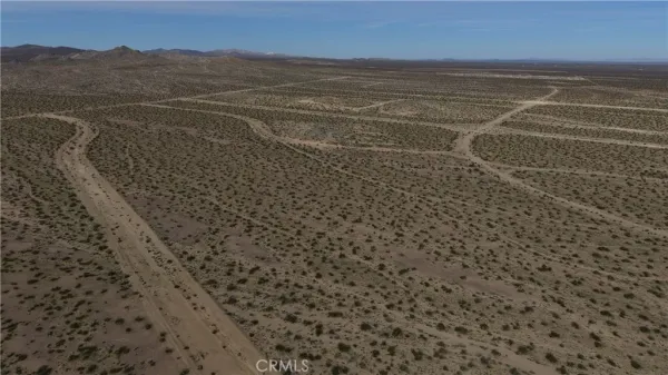 a view of a room next to a yard