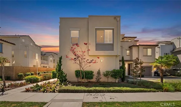 front view of a house with a street