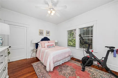 a bedroom with a bed furniture and a window