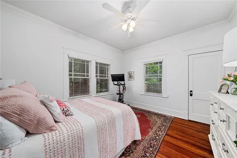 a bed room with a bed and a window