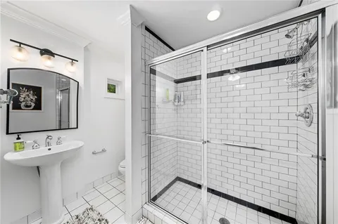 a bathroom with a sink and mirror