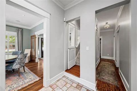 a living room with furniture and a rug
