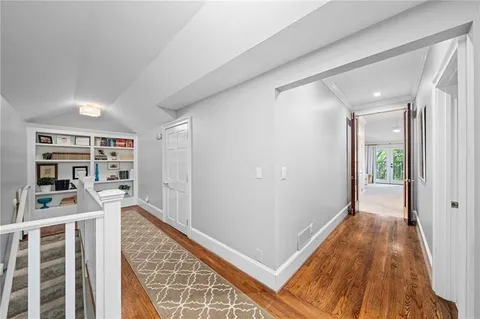 a view of livingroom with furniture and wooden floor