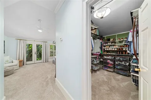 a view of empty room with floor to ceiling window