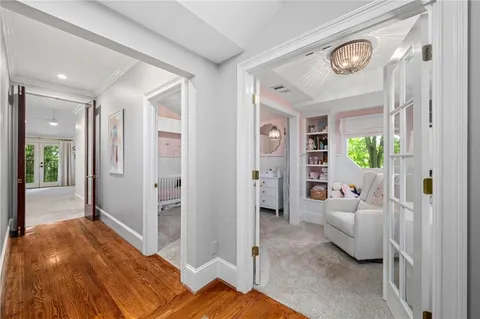 a bedroom with a bed and a view of bedroom