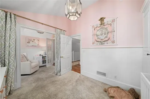 a view of livingroom with furniture and ceiling fan