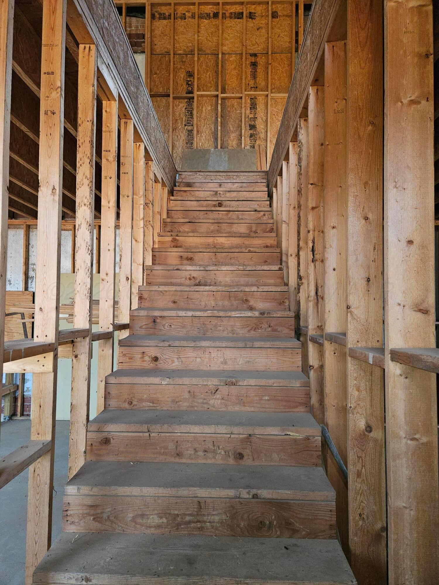 322 Main Street Panhandle, TX 79068 - Photo 10 of 19 Stairs going up to 2nd floor