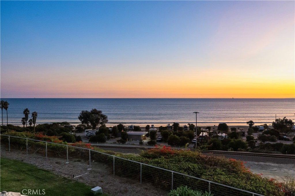 25836 Dana Bluff West, Unit 32 Dana Point, CA 92624 - Photo 32 of 47 a view of a house with a yard and sitting area