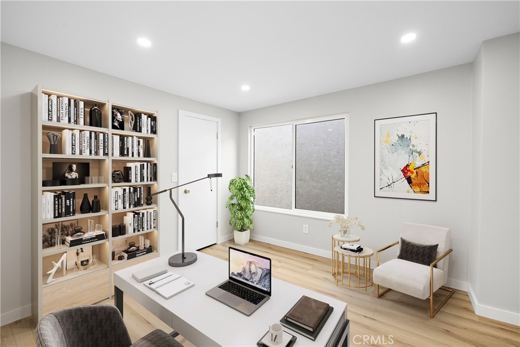 25836 Dana Bluff West, Unit 32 Dana Point, CA 92624 - Photo 35 of 47 a living room with furniture and a book shelf