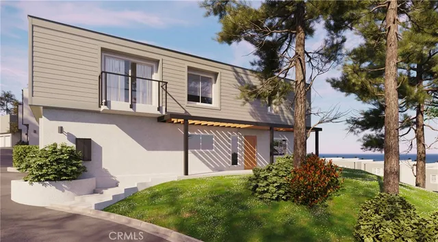 a view of a big house with a big yard plants and large trees