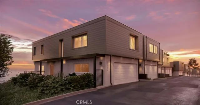 a view of an ocean and city