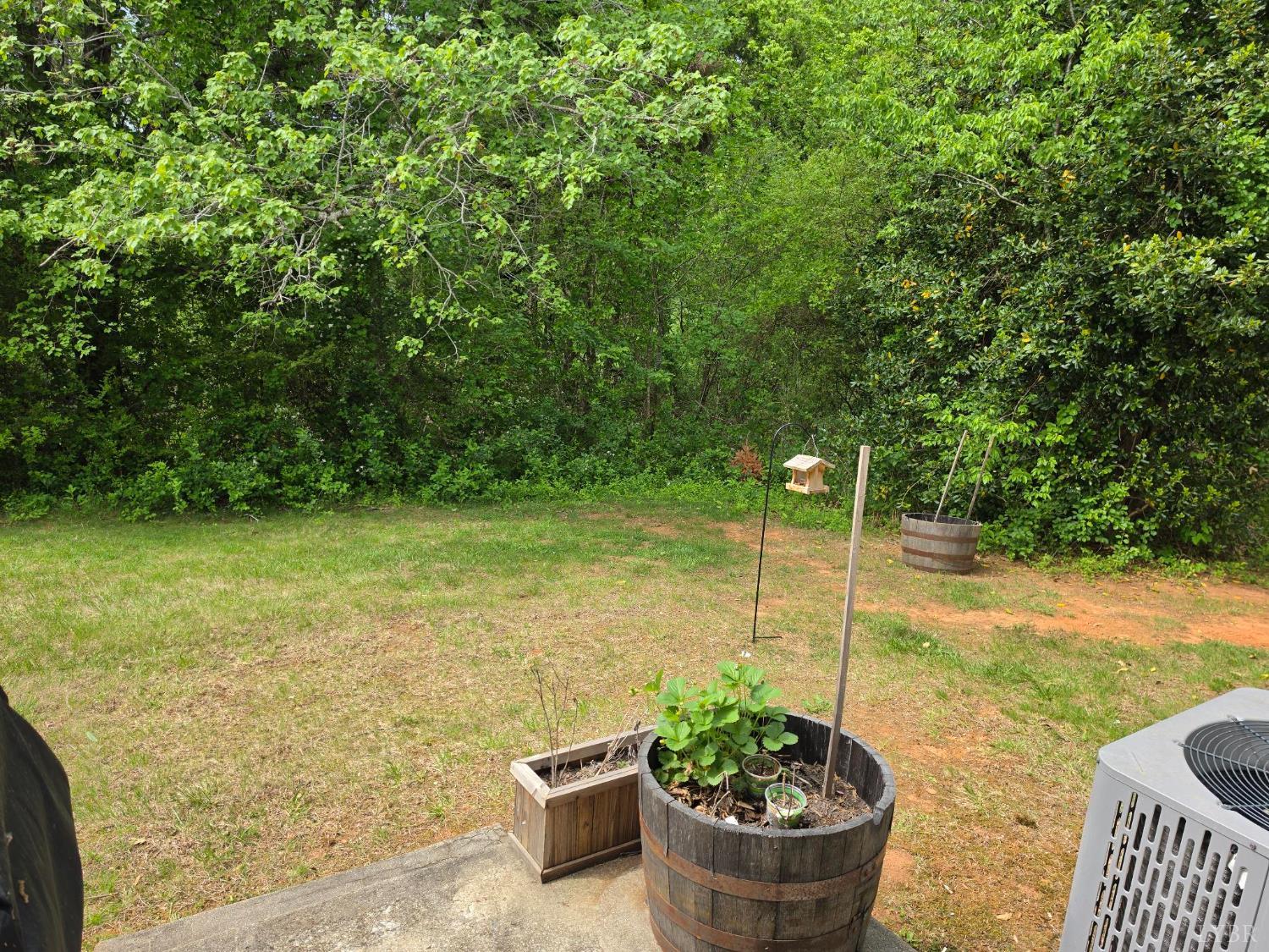 178 Dulwich Drive, Unit 178 Amherst, VA 24521 - Photo 4 of 17 a view of a backyard with sitting area