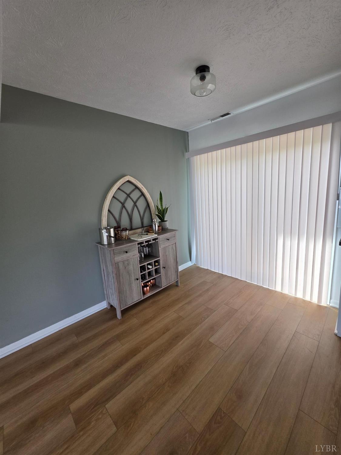 178 Dulwich Drive, Unit 178 Amherst, VA 24521 - Photo 6 of 17 a view of a livingroom with wooden floor