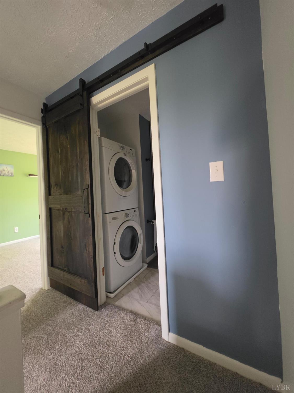 178 Dulwich Drive, Unit 178 Amherst, VA 24521 - Photo 10 of 17 a utility room with dryer and washer