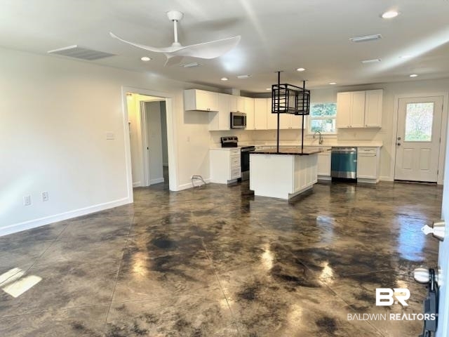 403 East 4th Street Bay Minette, AL 36507 - Photo 5 of 19 Spacious living area with open concept to the Kitchen
