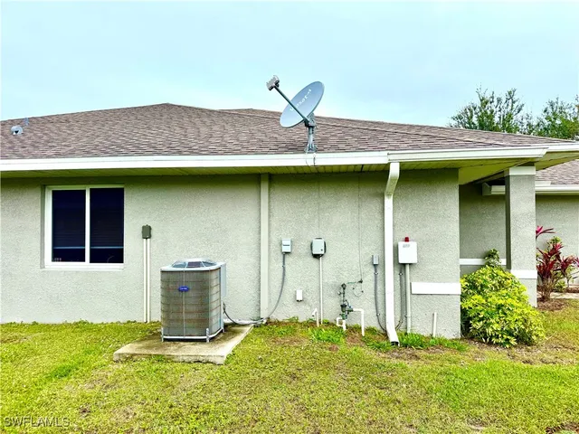 a house view with a garden space