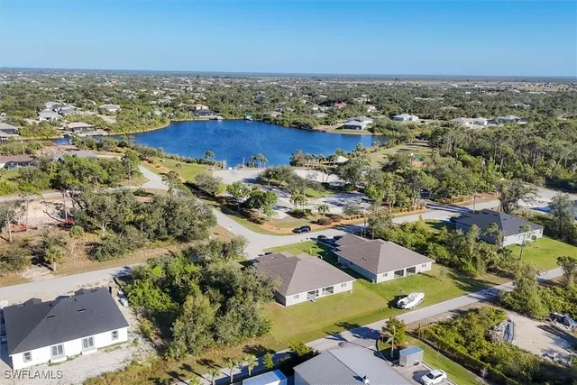 a sign that is next to a road