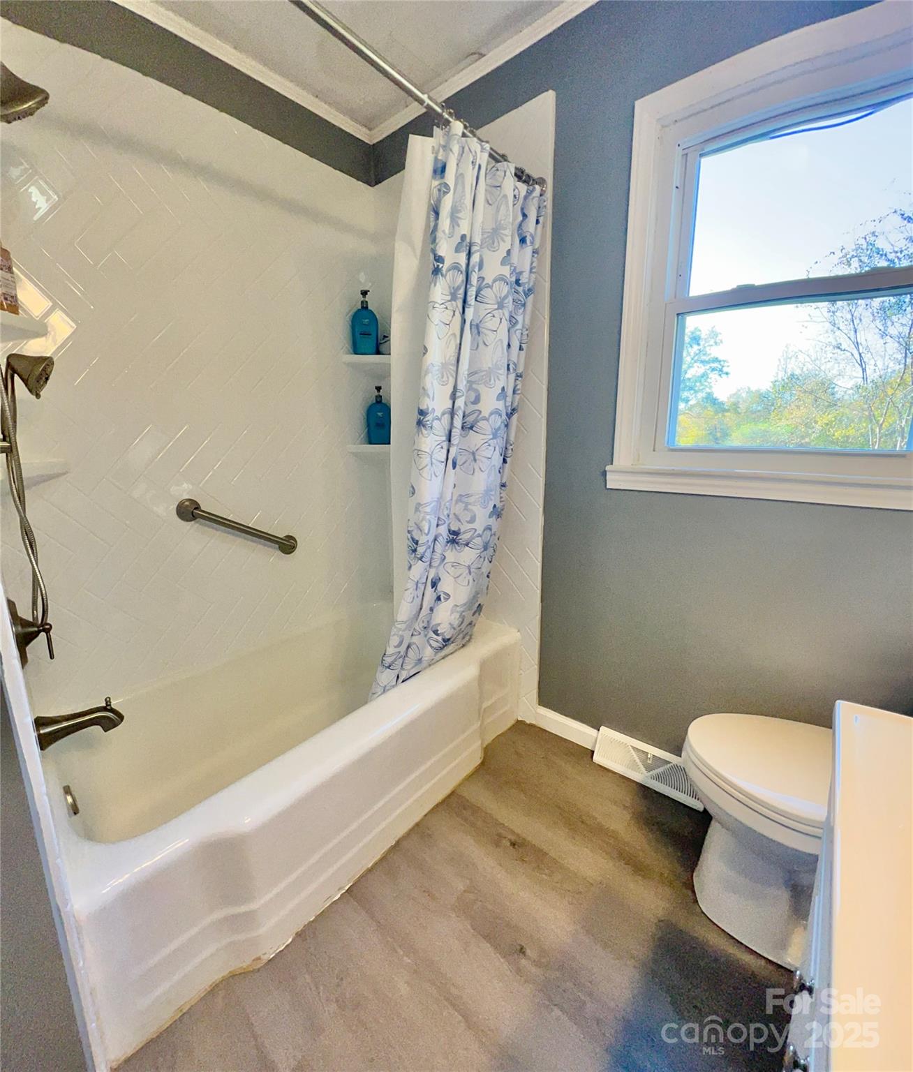 240 Hamrick Road Mooresboro, NC 28114 - Photo 13 of 23 a bathroom with a toilet and a bathtub