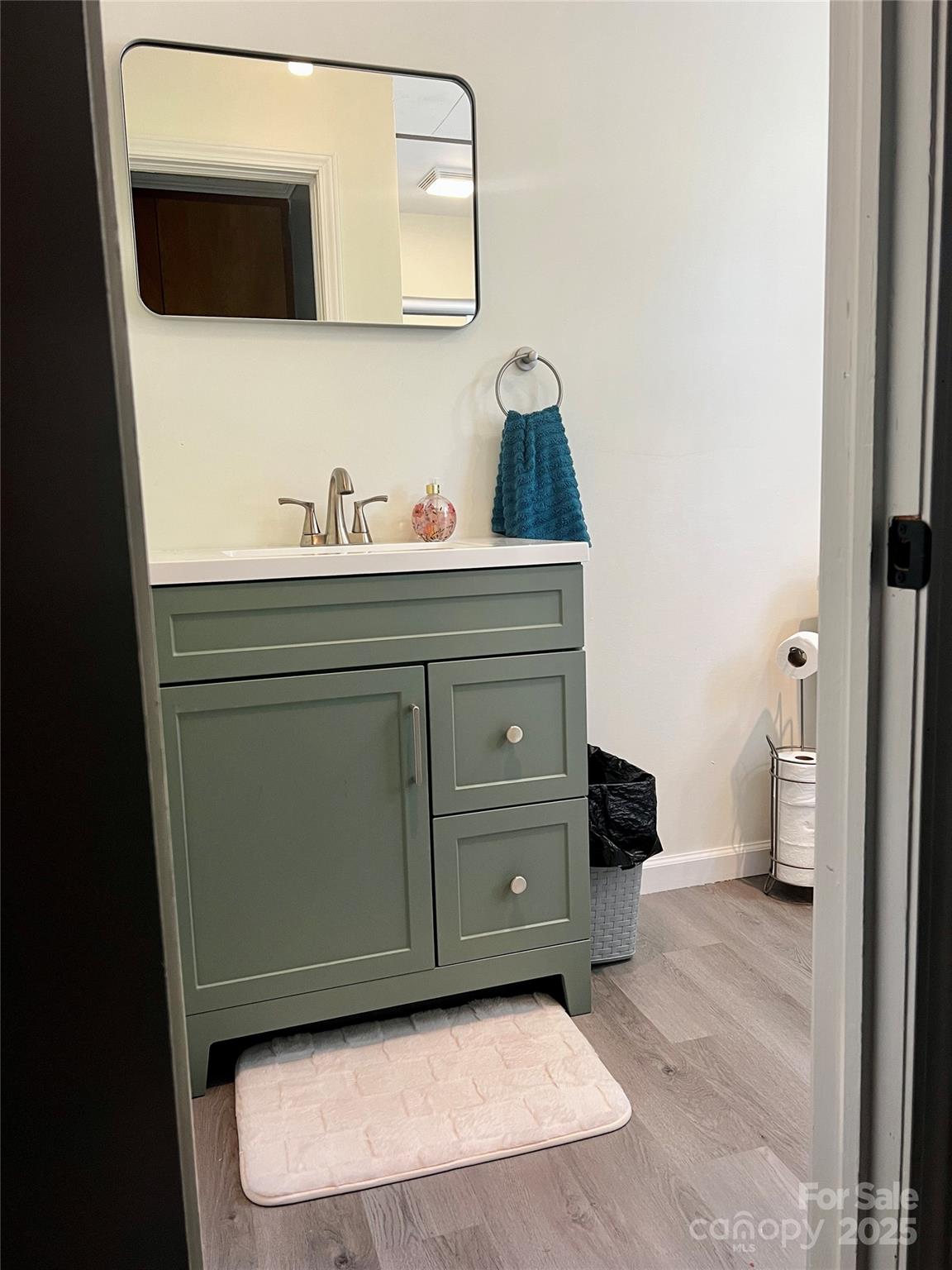 240 Hamrick Road Mooresboro, NC 28114 - Photo 19 of 23 a bathroom with a sink and a mirror