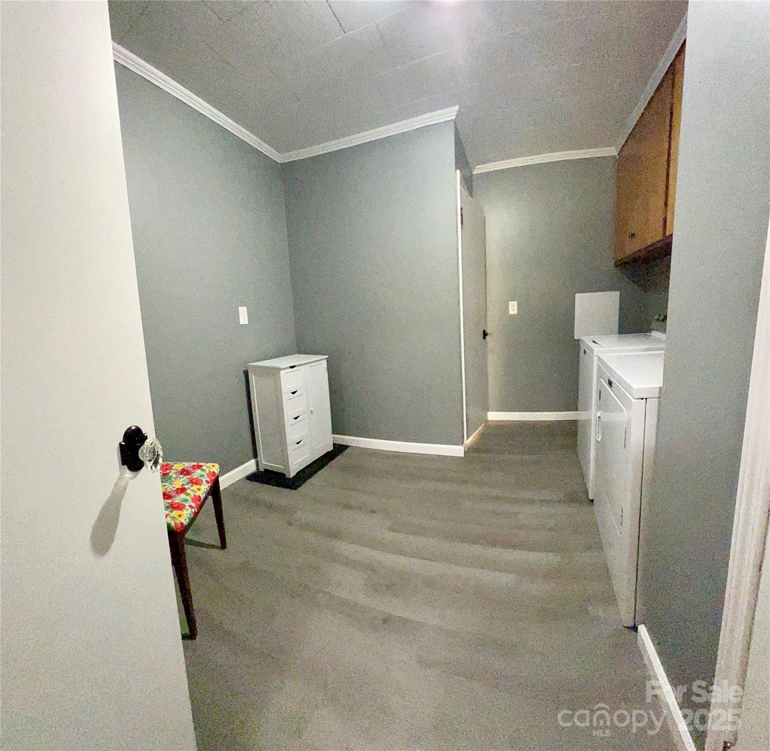 240 Hamrick Road Mooresboro, NC 28114 - Photo 22 of 23 a bedroom with a bed and wooden floor